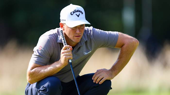 Alex Noren reads a green during a PGA Tour event.